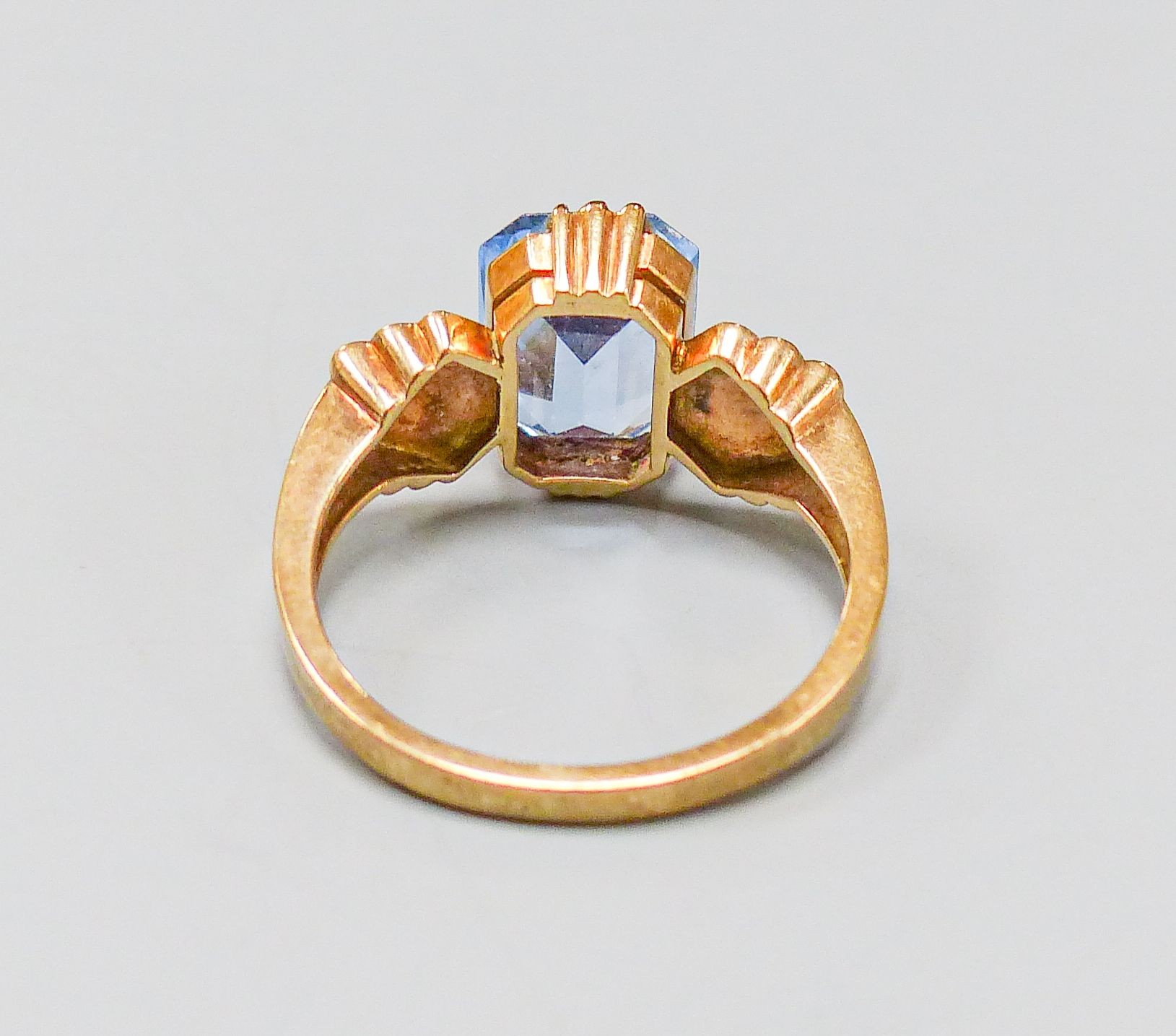 A 9ct and blue paste set dress ring, size O, gross weight 3.8 grams.